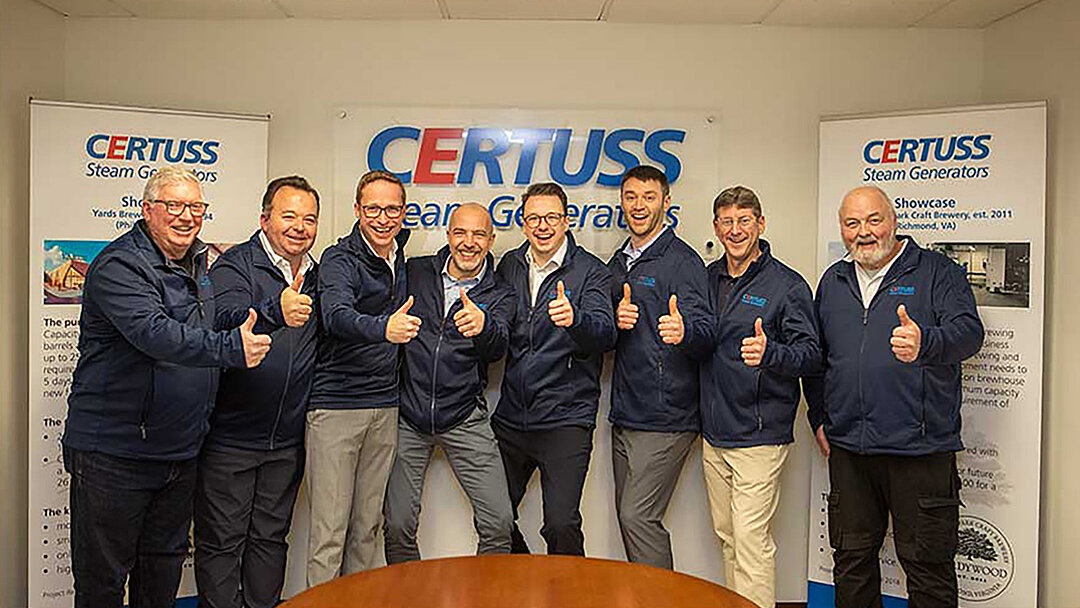 [Translate to Französisch:] Group photo of CERTUSS employees